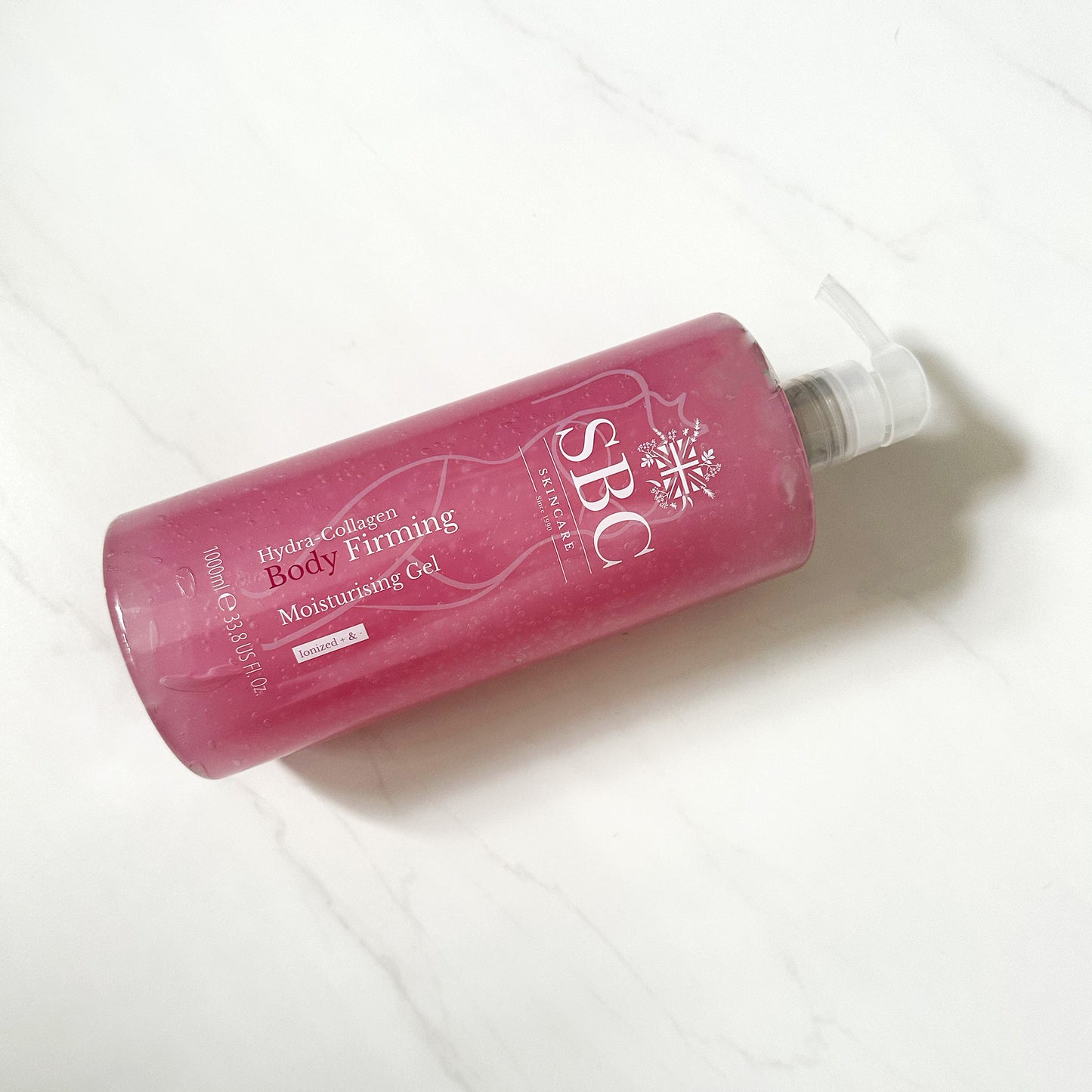 Hydra-Collagen Body Firming Moisturising Gel on a marble background