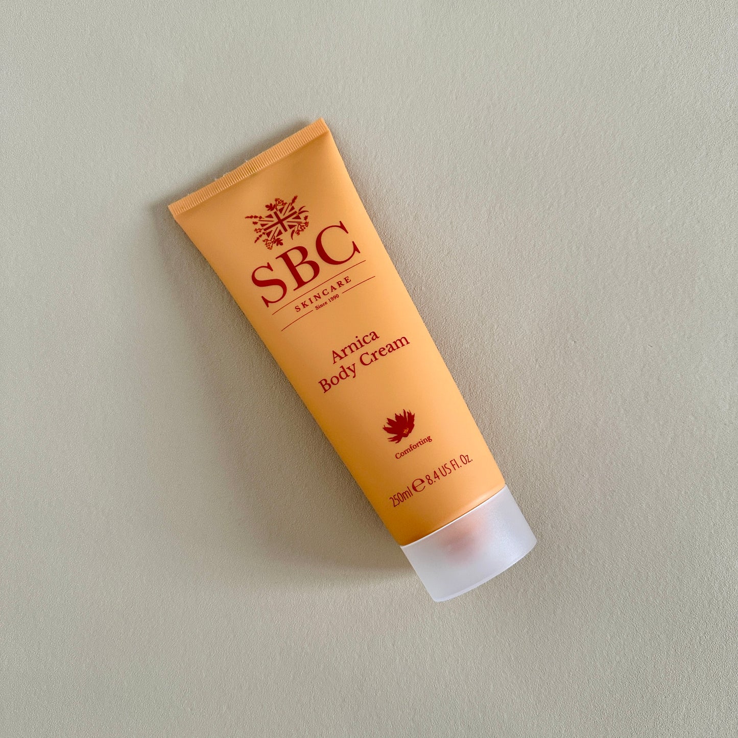 Arnica body cream flatlay