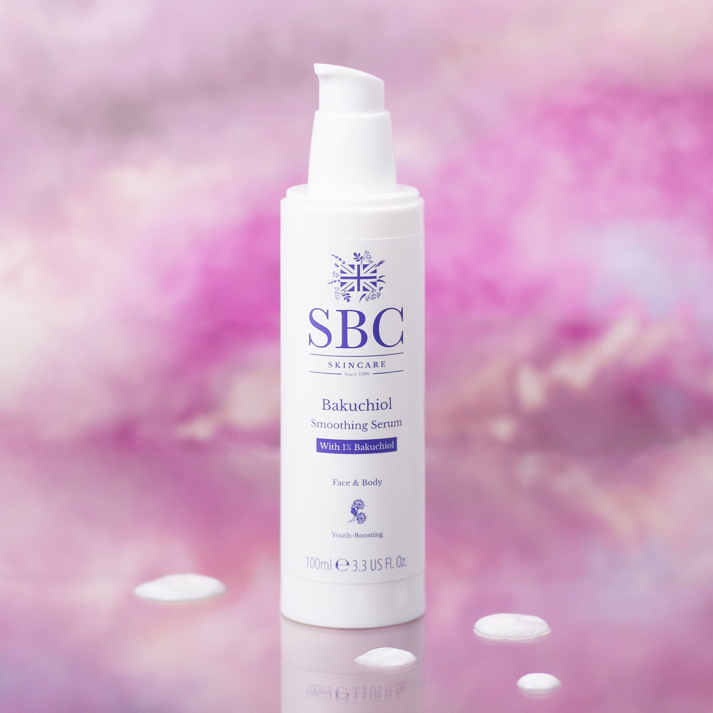 Bakuchiol Smoothing Serum on a multicoloured background with drops of serum