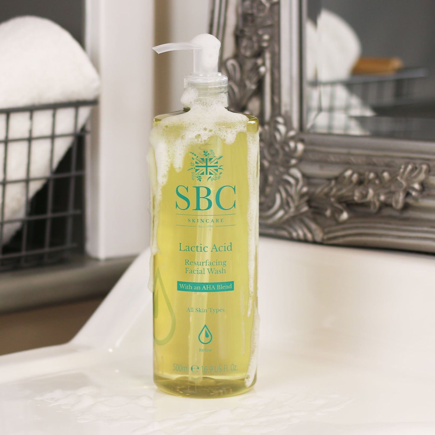 Lactic Acid Resurfacing Facial Wash with foamy bubbled covering it