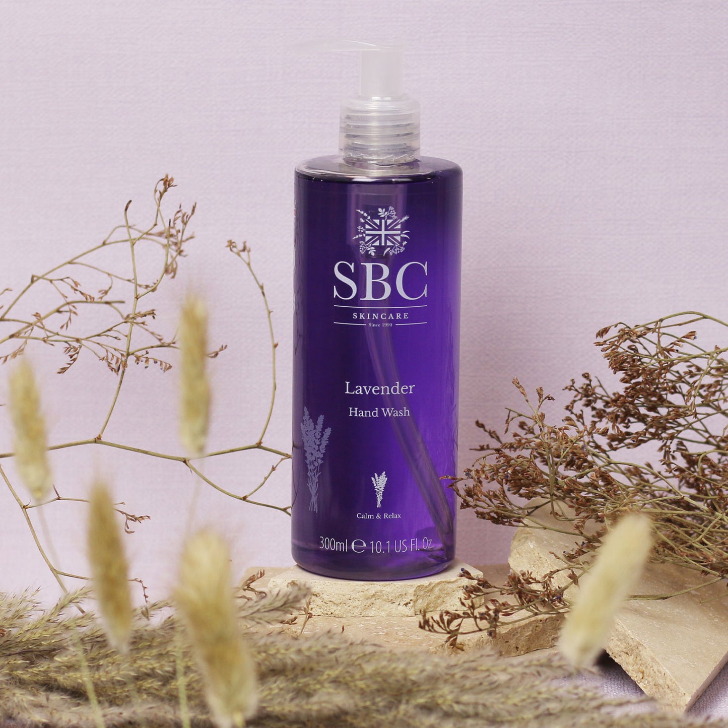 Lavender Hand Wash surrounded by dried flowers