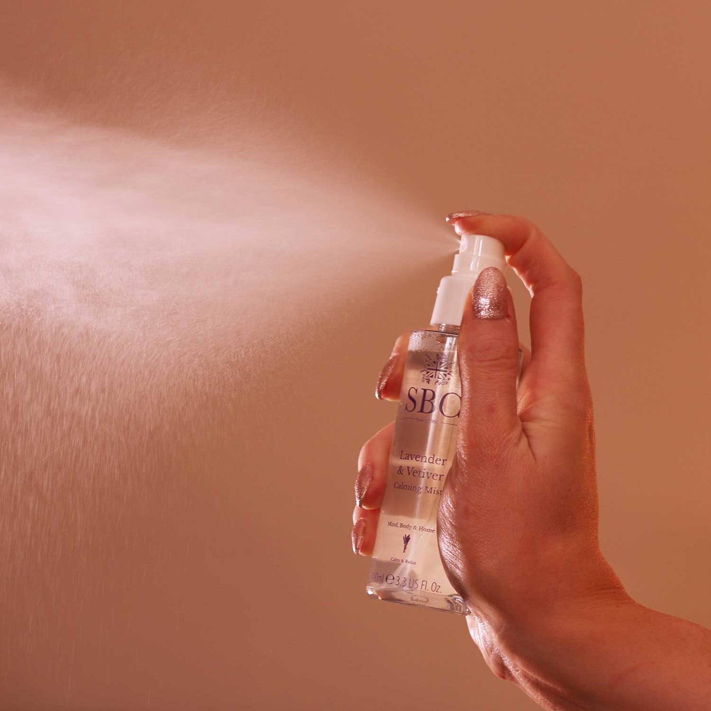 Lavender & Vetiver Calming Mist being sprayed