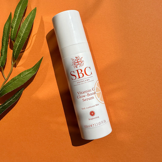 Vitamin C Serum 100ml on orange background