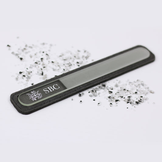 Crystal Nail File on a white background with silver sparkles 